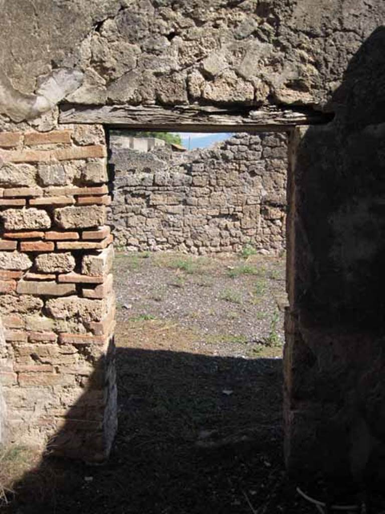 VIII.7.26 Pompeii. September 2010. Looking east through doorway into atrium, from second room. Photo courtesy of Drew Baker.
