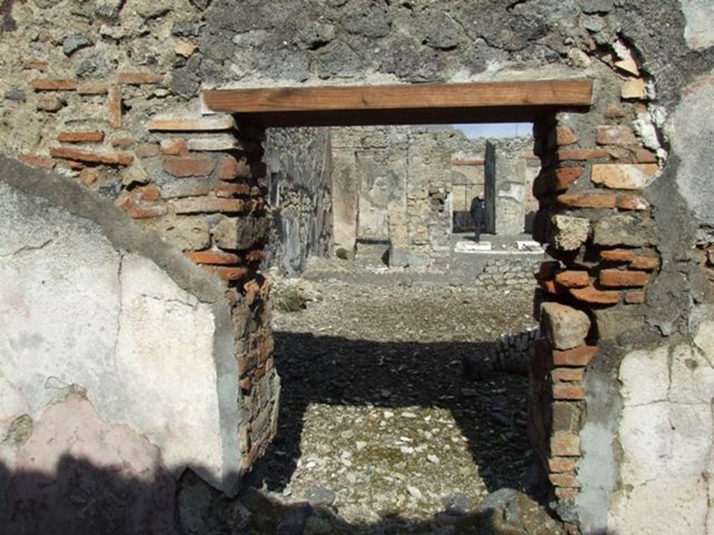 IX.2.18 Pompeii. March 2009.  Room 10.  Triclinium, East wall with window onto Garden area.