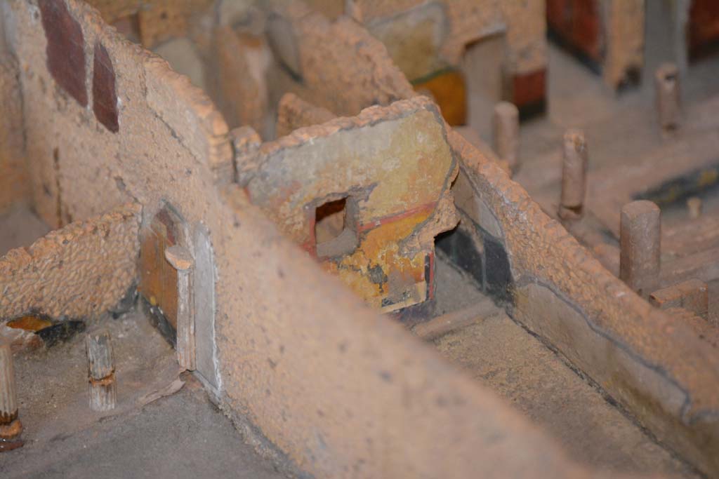 IX.5.6, in centre, Pompeii. July 2017. Looking towards rear south wall of garden area, with corridor leading to IX.5.17.
Extract from cork model in Naples Archaeological Museum.
Foto Annette Haug, ERC Grant 681269 DÉCOR.
