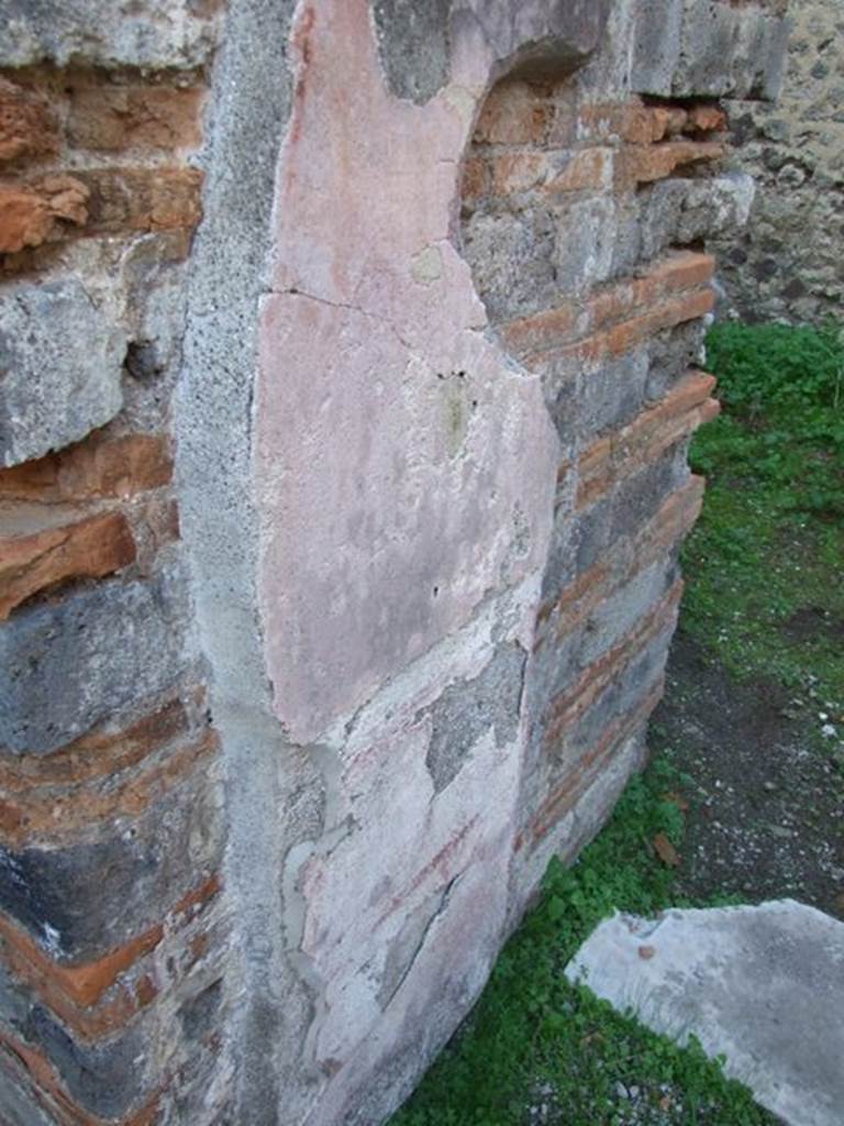 IX.5.11 Pompeii. December 2007.  Plastered wall between rooms 9 and 10 in north-west corner of atrium, and doorway to room 10.
