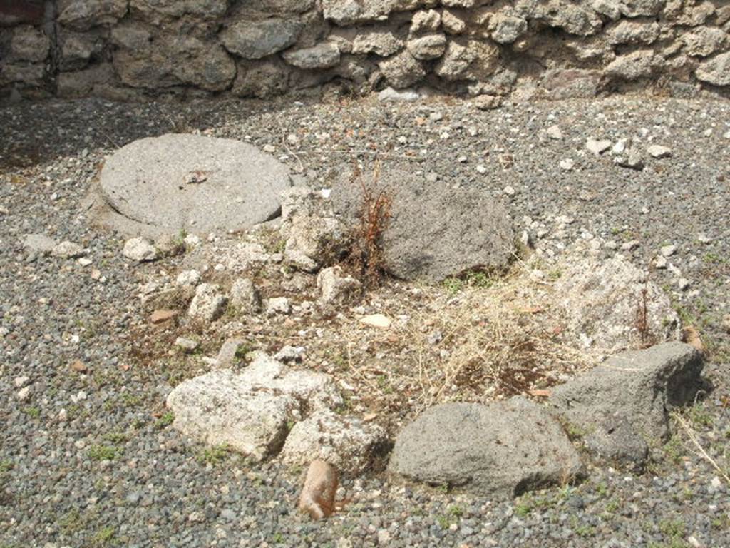 IX.6.c Pompeii. May 2005. Western side of floor of shop.