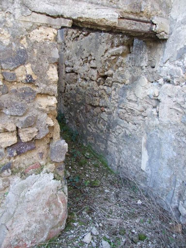 IX.9.13 Pompeii.  March 2009.  Doorway to Room 10. Latrine.