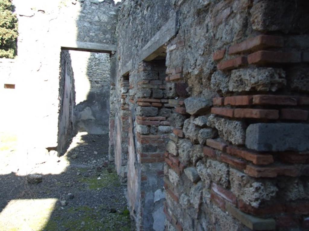 IX.9.d Pompeii. March 2009.  Looking east along south side of atrium b.
Looking across doorways to rooms g and m, to room l, triclinium.
