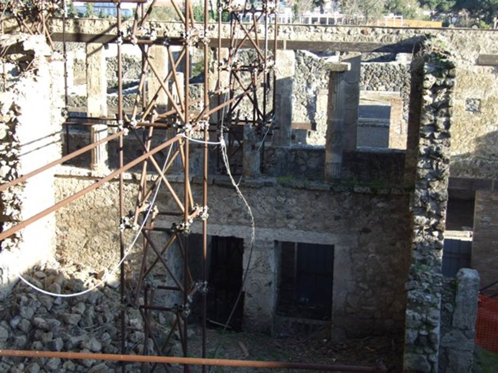 IX.12.4 and IX.12.3 Pompeii.  March 2009. Taken from the rear.  Looking south to rear of terrace, and rooms below, with door to IX.12.2  (Steps to upper floor) on right.