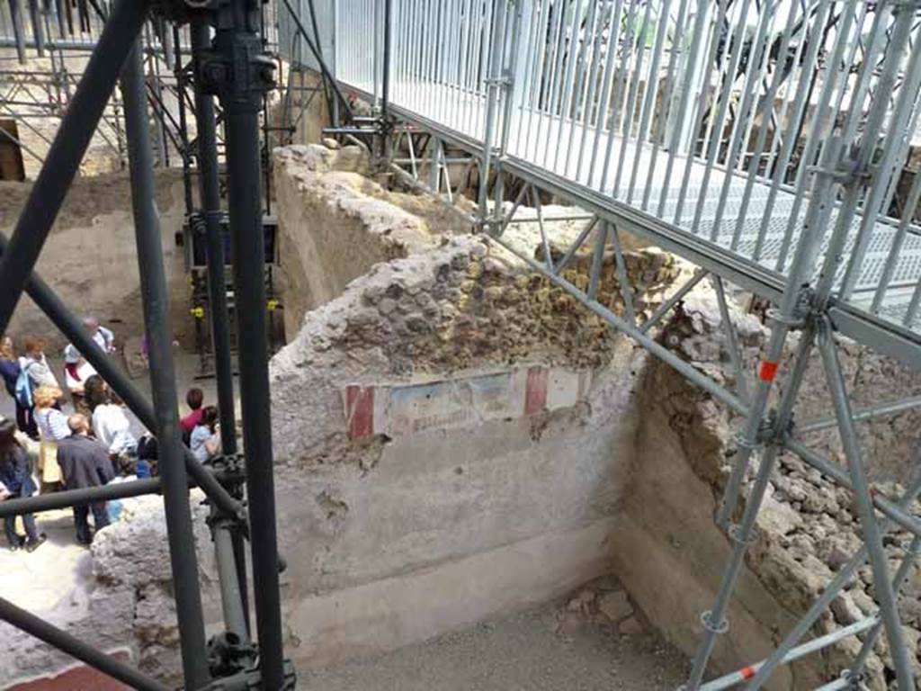 IX.12.4 Pompeii. May 2010. Room “f”, south-east corner of room being excavated, on west side of bakery at IX.12.6. 

