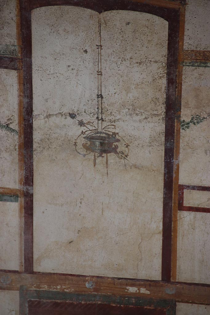 IX.12.9 Pompeii. October 2024. Room 13, detail from upper north wall. Photo courtesy of Klaus Heese.