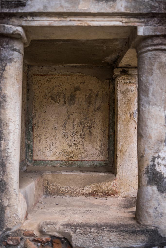 IX.14.4 Pompeii. July 2024. 
Looking towards north wall of lararium. Photo courtesy of Johannes Eber.
