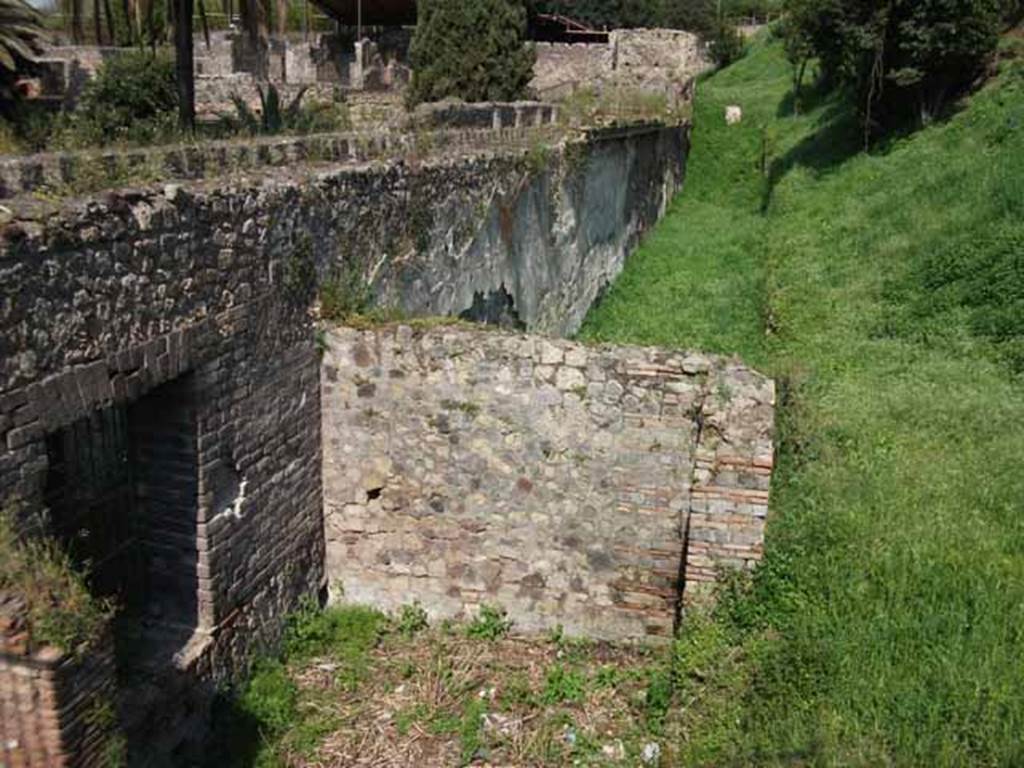 HGW24 Pompeii. May 2010. Looking east along south exterior side of portico from south-west corner. According to the PAH, plan by La Vega, no.76, and 92 were found in this area.
