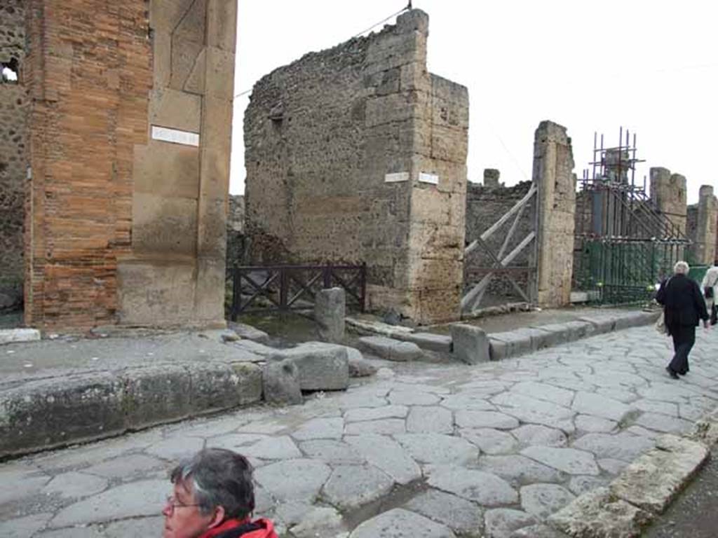 Via della Fortuna, north side, May 2010. Junction with Vicolo del Labirinto between VI.12 and VI.13.