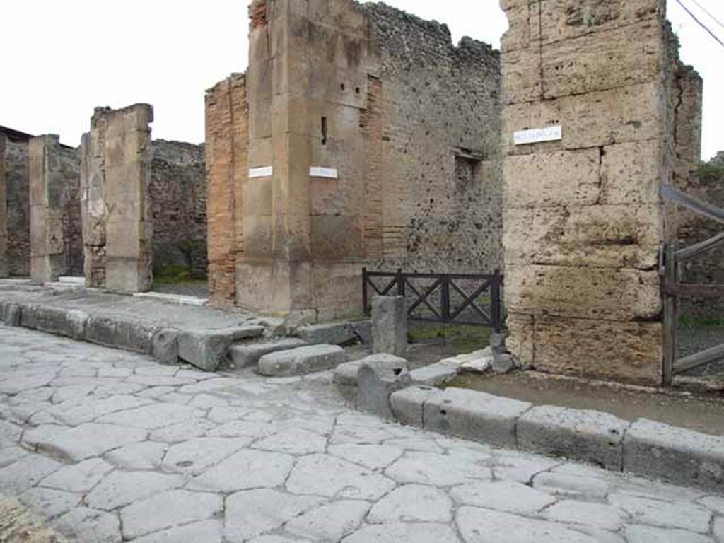 Via della Fortuna, north side, May 2010. Looking west at junction with Vicolo del Labirinto between VI.12 and VI.13.