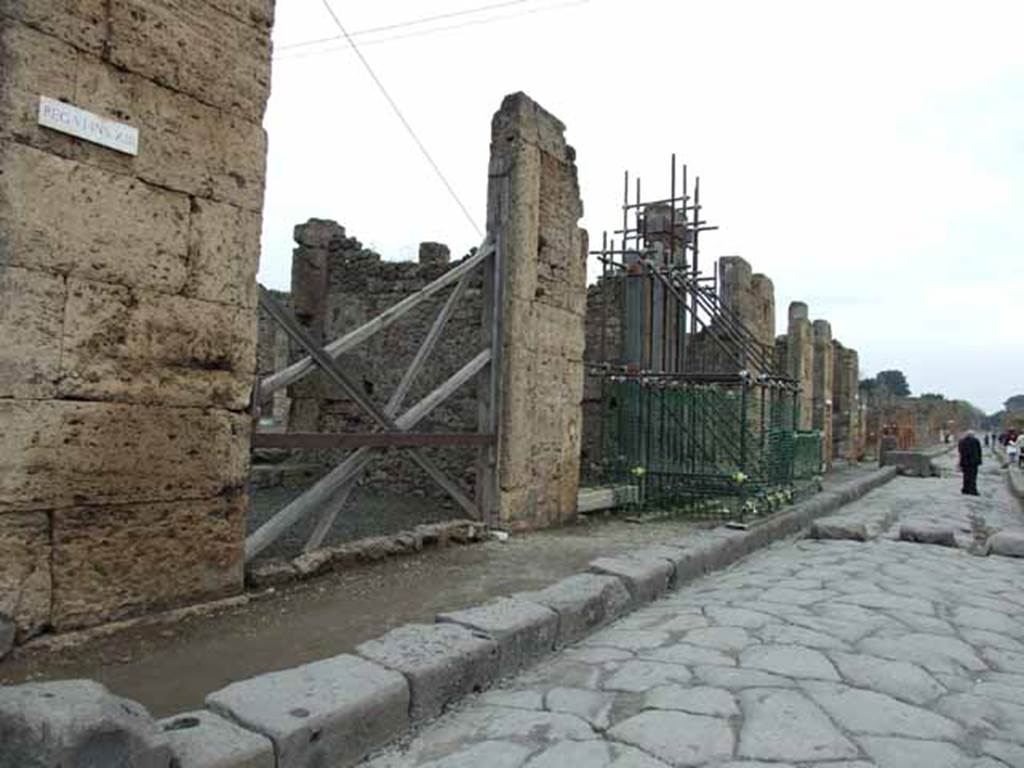 Via della Fortuna, north side, May 2010. Looking east along VI.13 between VI.13.1 to VI.13.7.