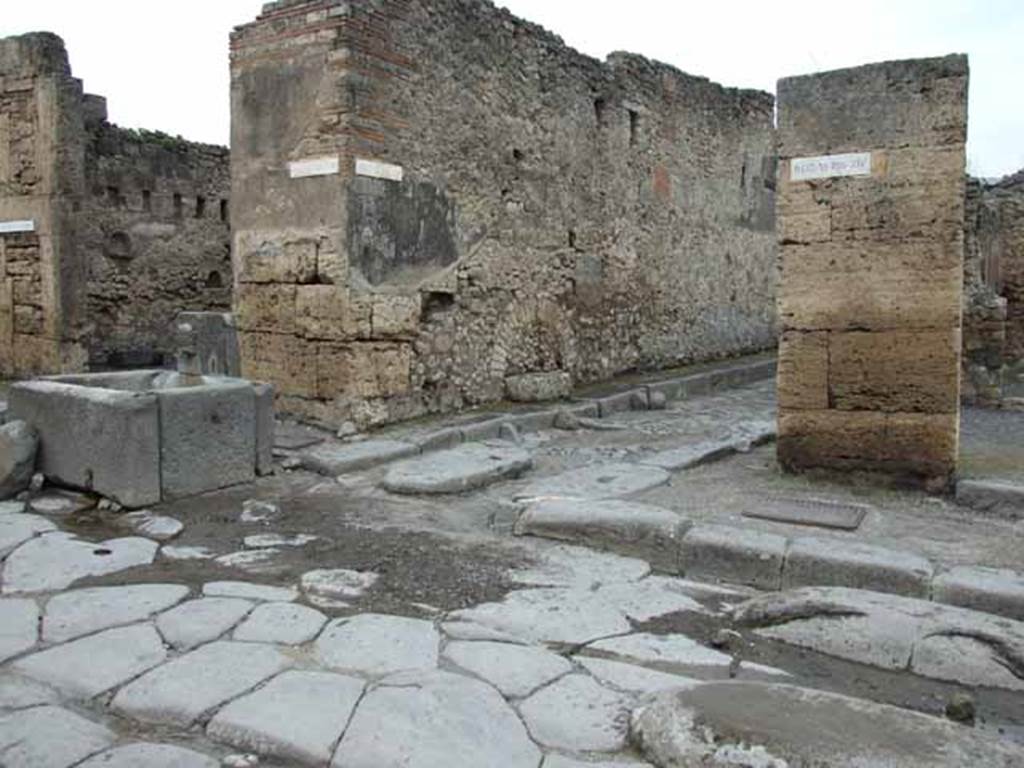 Via della Fortuna, May 2010. Looking west towards junction with Vicolo dei Vettii between VI.13 and VI.14.