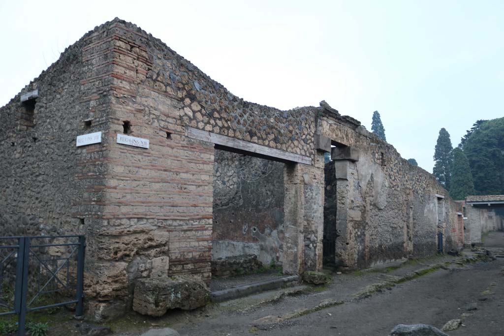 Via di Castricio, north side. December 2018. Looking east between I.13.13 and I.13.10, on right. Photo courtesy of Aude Durand.