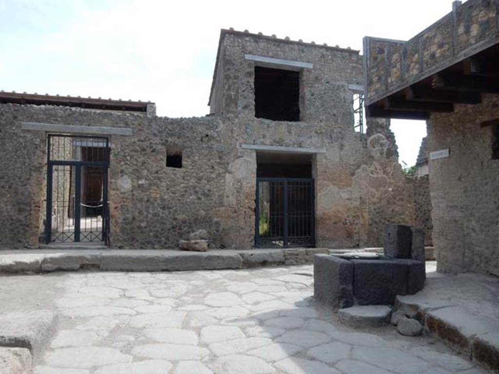 Vicolo del Menandro, Pompeii, after restoration. May 2017. Looking east to end of the Vicolo with its junction with Vicolo di Paquius Proculus.  Photo courtesy of Buzz Ferebee.
