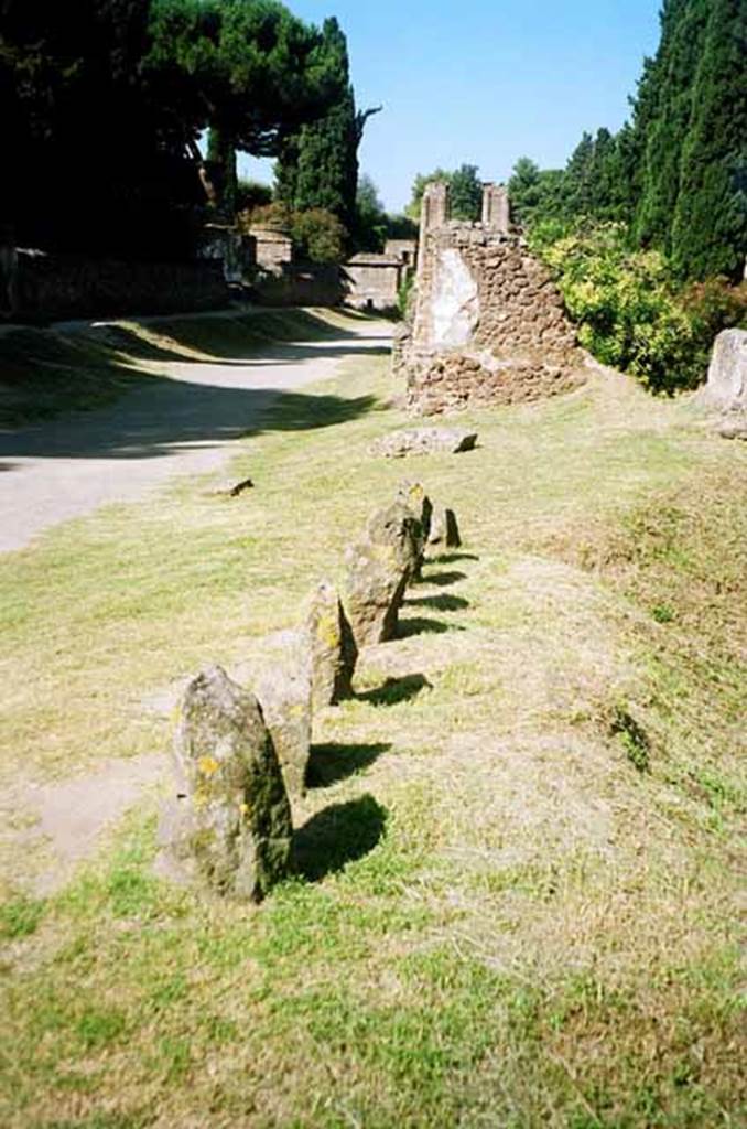 Pompeii Porta Nocera. July 2010. Tomb 34EN, looking west to 30EN on Via delle Tombe.  Photo courtesy of Rick Bauer.
