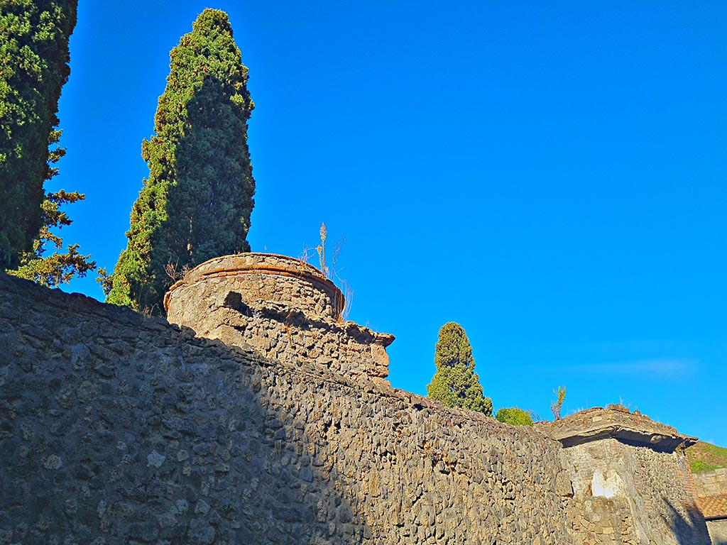 Pompeii Porta Nocera. October 2024. Tomb 3OS, looking west at rear of Tomb 1OS, on right. Photo courtesy of Giuseppe Ciaramella.