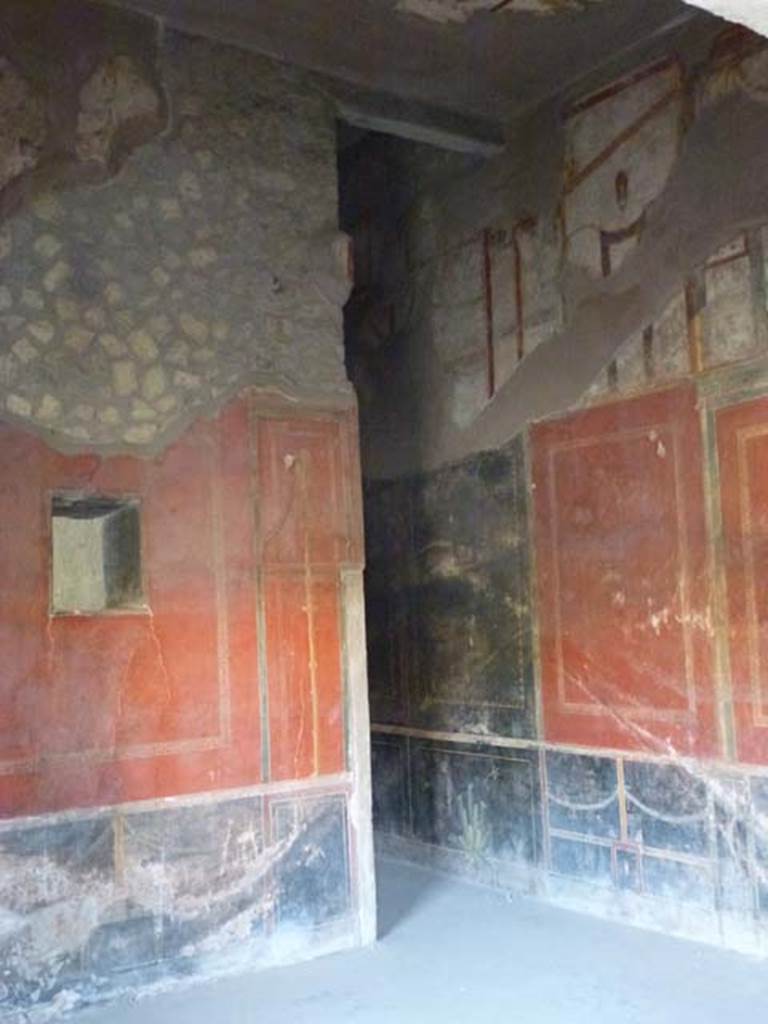 Oplontis, September 2011. Room 66, looking towards south wall with niche, and south-west corner. Photo courtesy of Michael Binns.